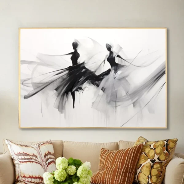 Deux silhouettes dansantes en noir et blanc